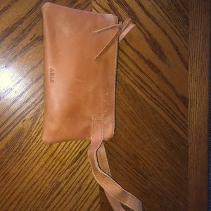 Brand new Able wristlet.  Model is rachel. The color is cognac leather.